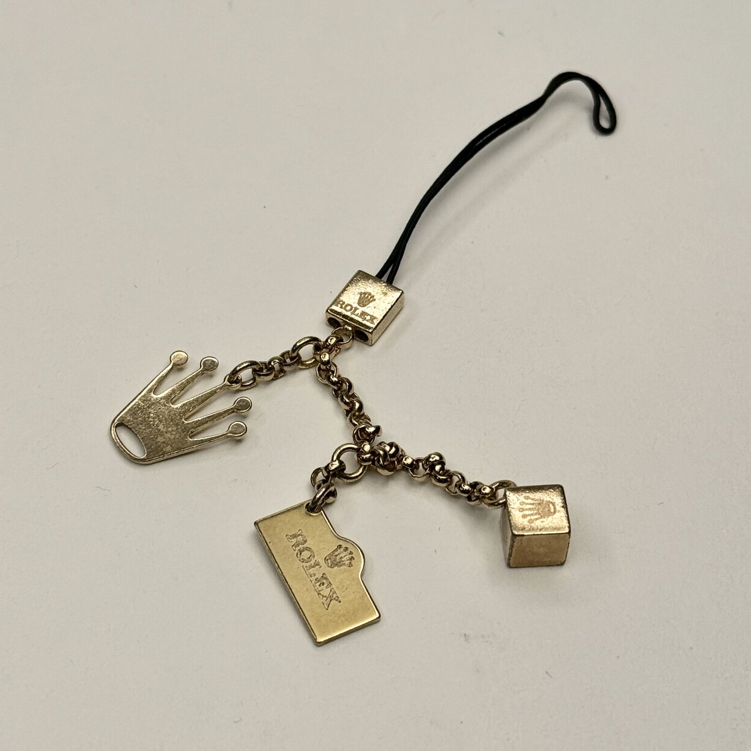 Vintage Rolex Gold Charm Accessory with Box – Collectible Tri-Charm